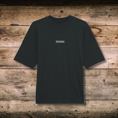 Oversized Damen-Shirt TRUST in Schwarz vorne auf Holz